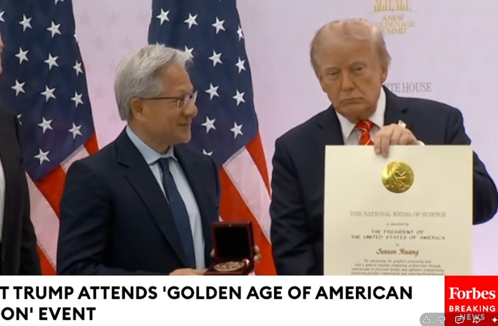 Jensen Huang receives the medal from President Trump