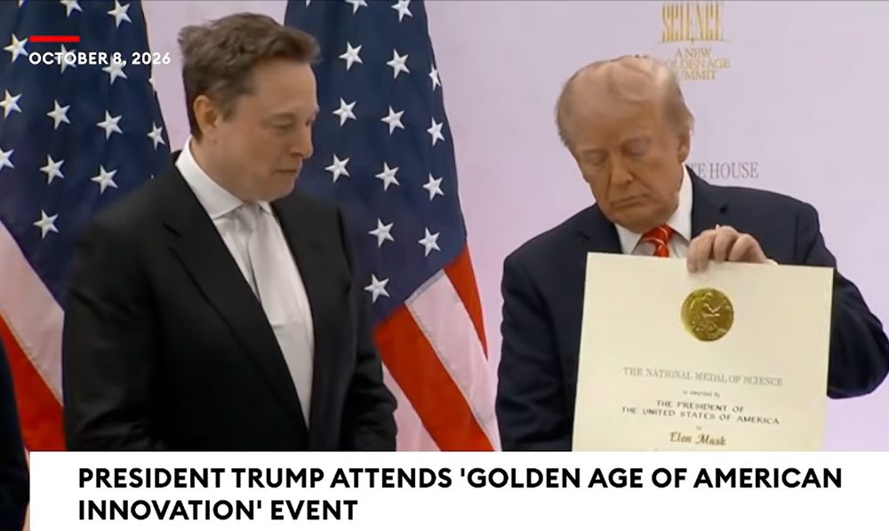 Elon Musk receives the medal from President Trump